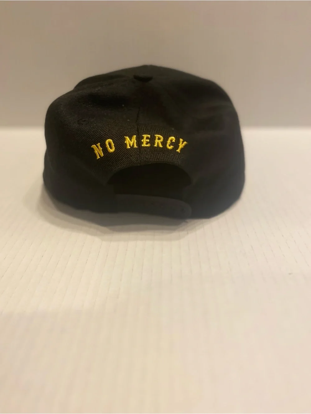 No Quarter Black & Gold Skull Patch Snapback Hat